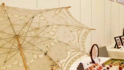 走向国际，看岱岳非遗大汶口花边伞如何在联合国绽放温暖光芒